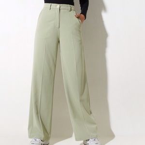 Sage green trousers from Motel Rocks, size medium